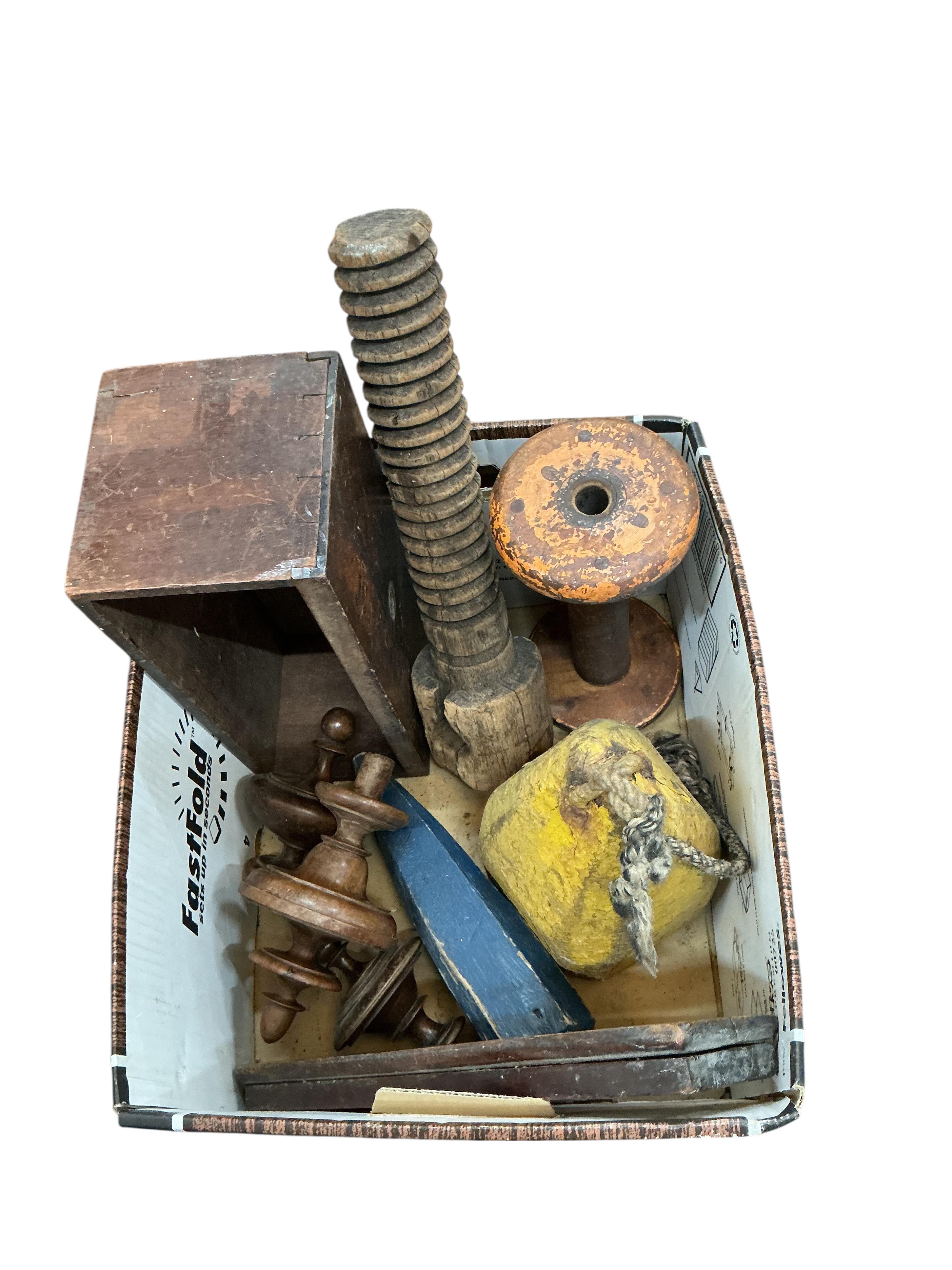 A quantity of assorted 19th century and later treen, chopping boards, hat moulds, etc.